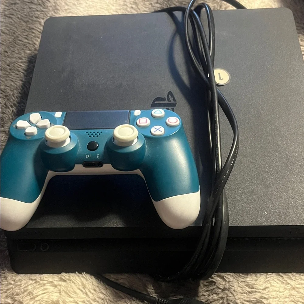 Sony Console with Teal and White Controller